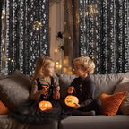 NICETOWN Black Sheer Halloween Curtains with Silver Spider Foil Print, Grommet Flowing Voile Sheer Window Treatment for Gothic Bedroom, W54 x L84, 2 Panels